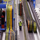 This gantry system will support robotic heads that will build the carbon fiber wings. (Images: AP)
